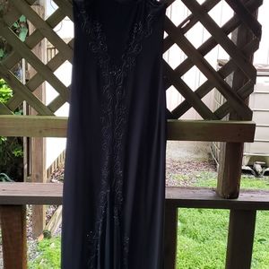 Long black beautifully fitted beaded evening dress